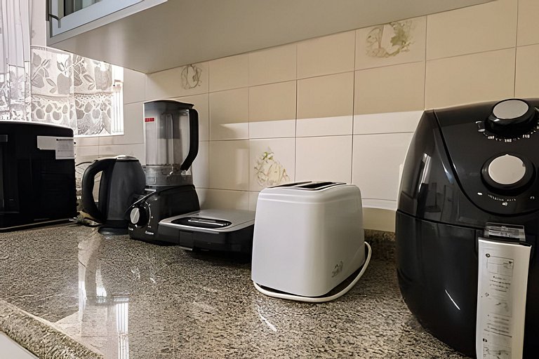 Casa c/ampla cozinha e 3 quartos p/ate 7 pessoas