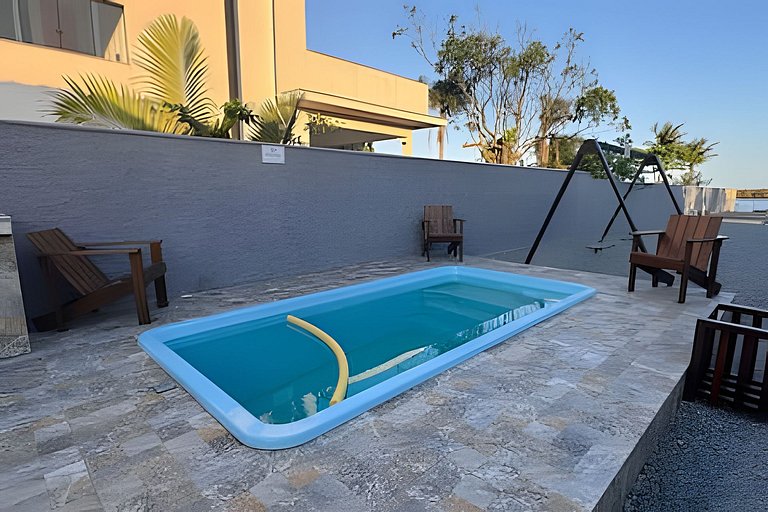Descanso na Lagoa: 2 Quartos, Deck Próximo ao Mar